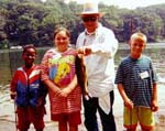 Boat captain Vern Kerrick from Montvale, NJ with (left to right) Davidlee Harris and Veronica Dolloff of Danbury, CT and Michael Shetler of Bethel, CT - July, 1998