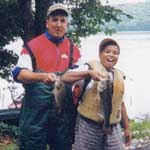 Boat captain Al Gagliarducci of Agawam, MA and Alex Neves of Danbury, CT.  Alex placed 2nd in Level I-A in the Big Fish category with a 2.79 pound bass. - Friday, August 18, 2000