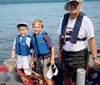 Boat captain Cliff Schoonmaker from Stone Ridge, NY with Kyle Radulski of Brewster, NY and Ryan Laskowski of Danbury, CT  Wednesday, August 14, 2002