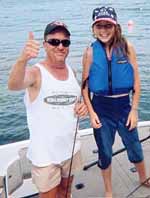 Boat captain Dean Gracey of Westbrook, CT and Nikki Neun of Wappanger Falls, NY  Thursday, August 15, 2002