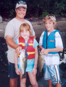 Boat Captain Mike Schmitt, Jr., Portia Baudisch of Sandy Hook, CT and Matt Rogers of Danbury, CT  Tuesday, August 16, 2005
