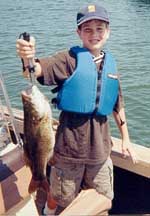 Mike Grise (11) of Brookfield, CT with 4  pound bass - August 14, 2001