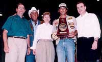 April 23, 1994, - Pine Bluff, Arkansas Bryan wins the Wrangler/BASS National Championship. Don Corkran, Ray Scott and Ronnie, Bryan and Ray Kerchal.